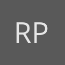 Ryan Price avatar consisting of their initials in a circle with a dark grey background and light grey text.