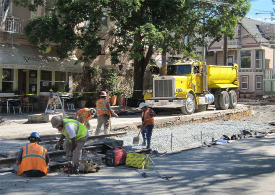 SFMTA capital crew ripping up the existing street and replacing track. Photos: Matthew Roth