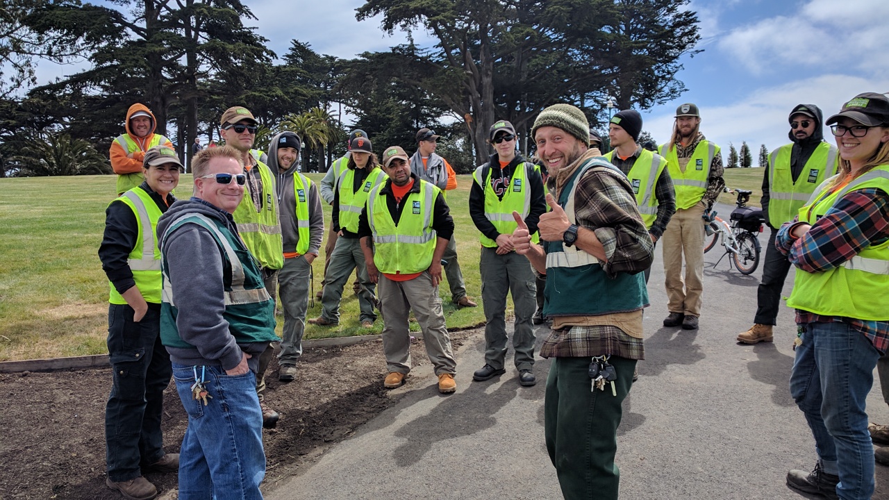 Shaw Sevenski and Andy Kushner telling Rec & Park interns where and what to plant.