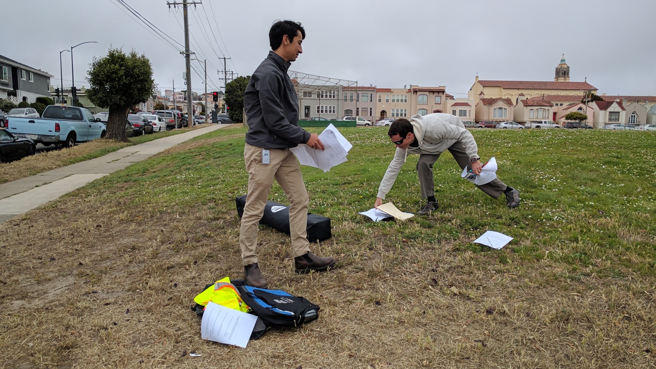Emilion __ and Dan Provence's meeting got off to a bad start when the wind started redistributing their paperwork. Photo: Streetsblog/Rudick