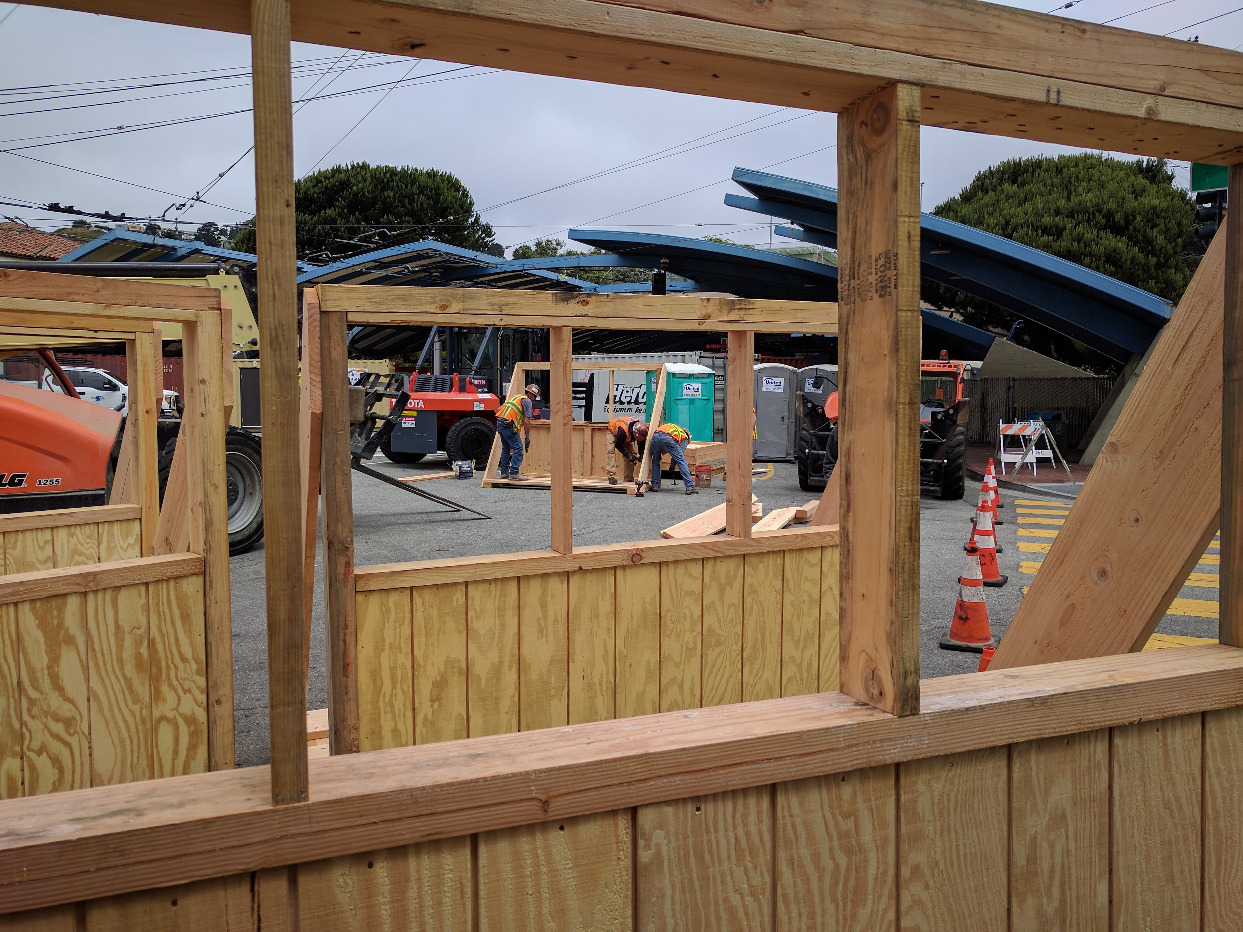 These shields are to protect pedestrians from dust and debris