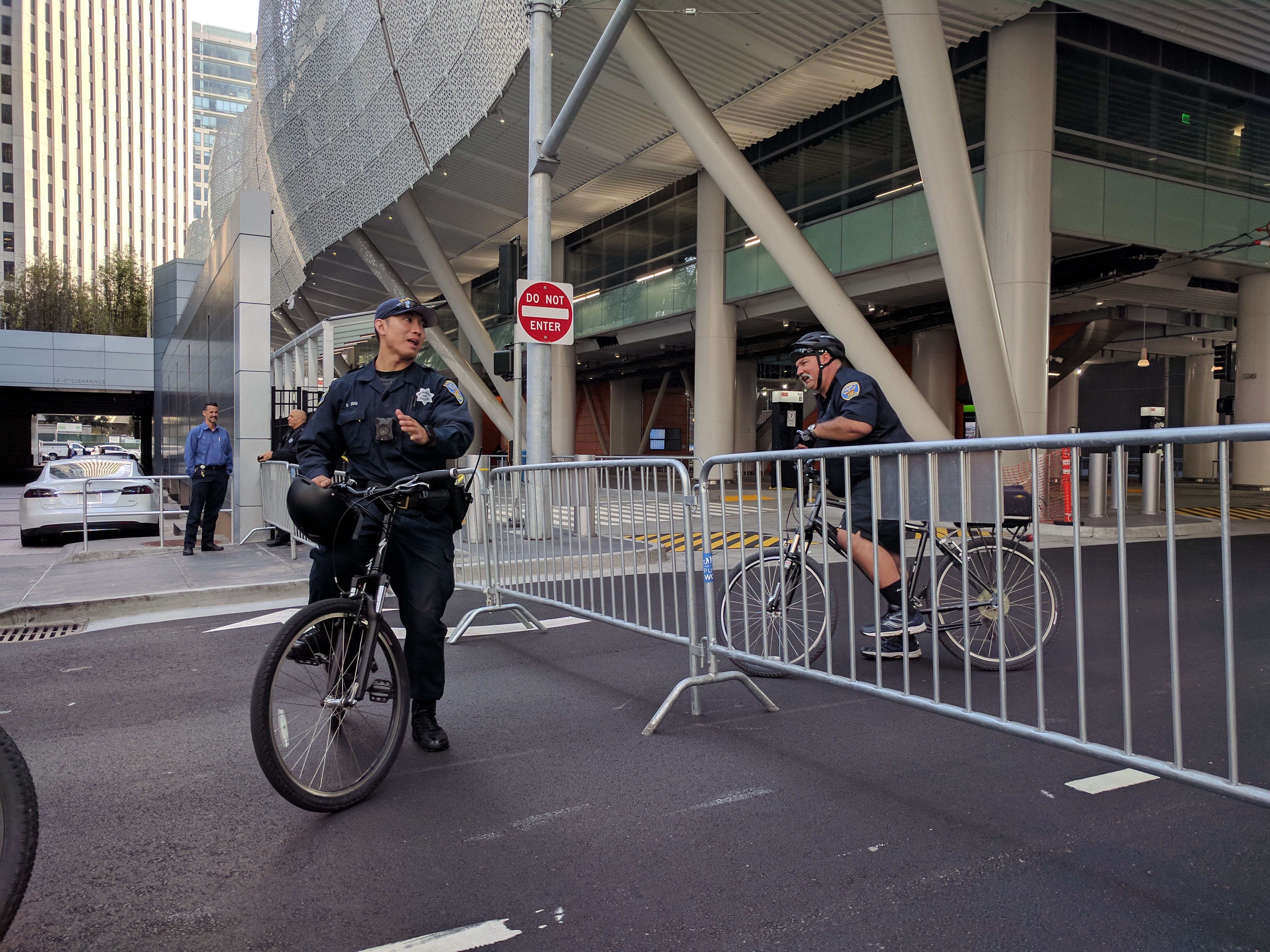 Police guarded Fremont Street under the Transit Center, now closed after a cracked beam was discovered