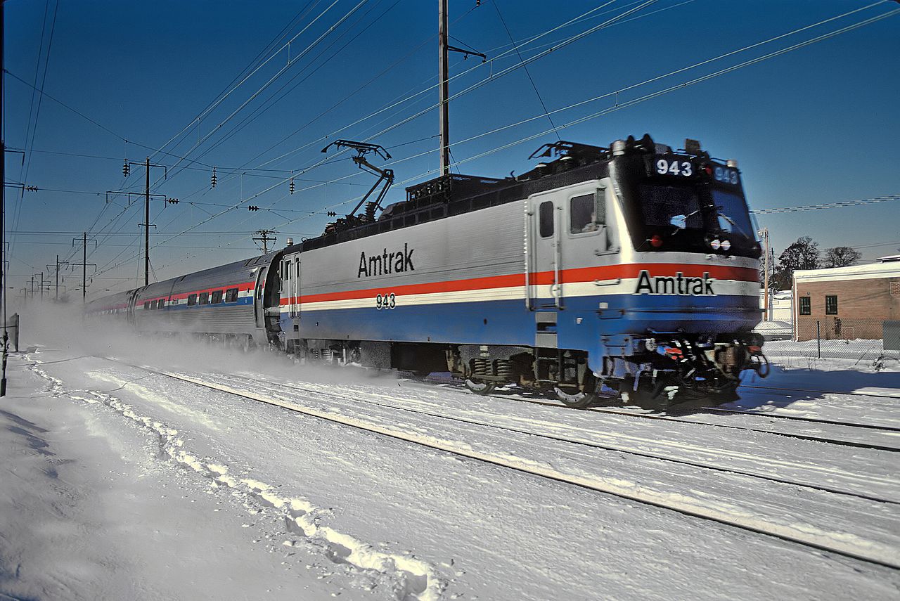 An AE-7 back in its glory days, here seen in New Jersey pulling a Metroliner between NYC and DC