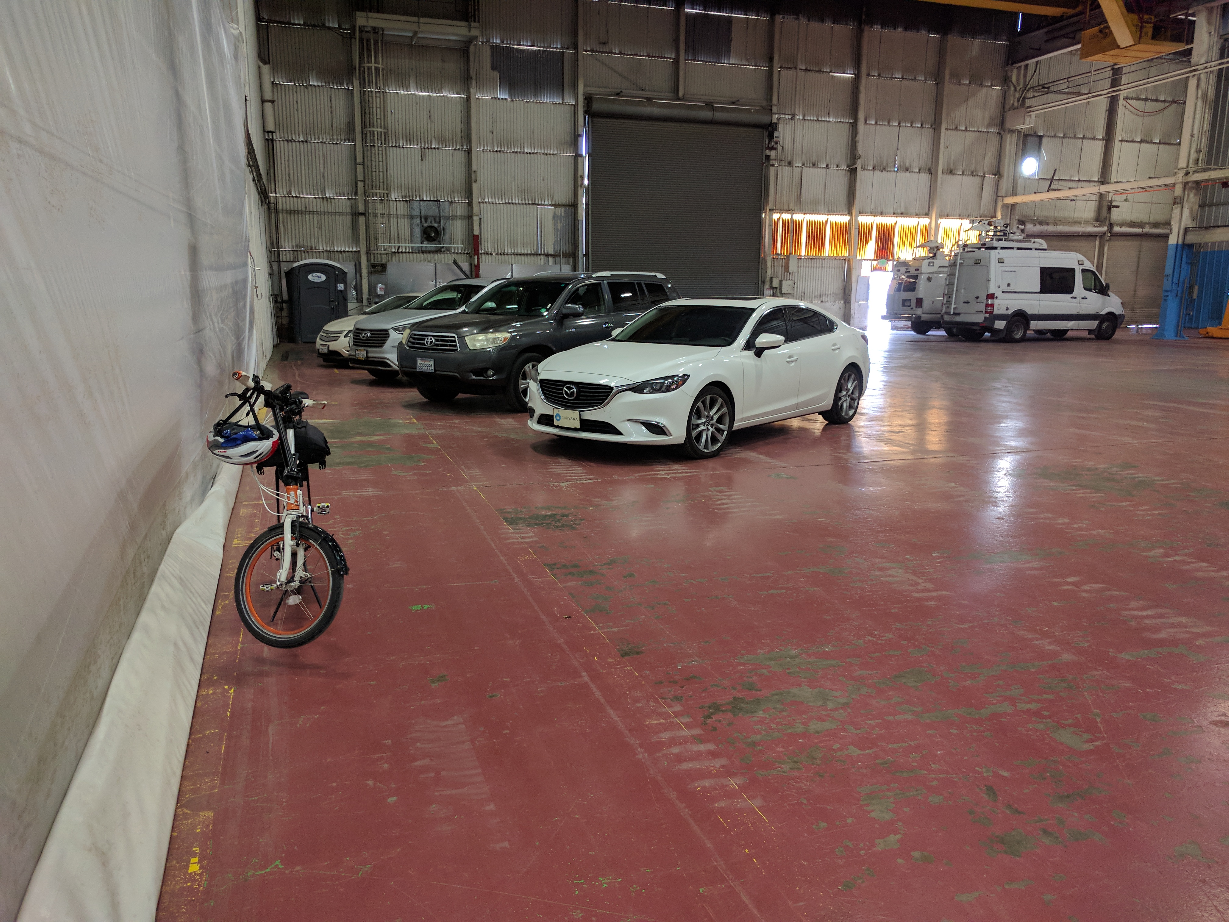 Apparently everyone, except Streetsblog, drove to the new train factory to give speeches about the importance of transit to reducing greenhouse gases