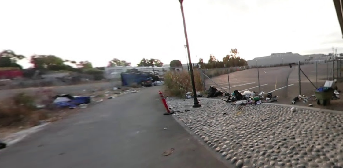 Another view of the "Death Star" route the city wants cyclists to take, with a fence on both sides, preventing people from cycling the direct route across the parking lot. Image: Google Maps