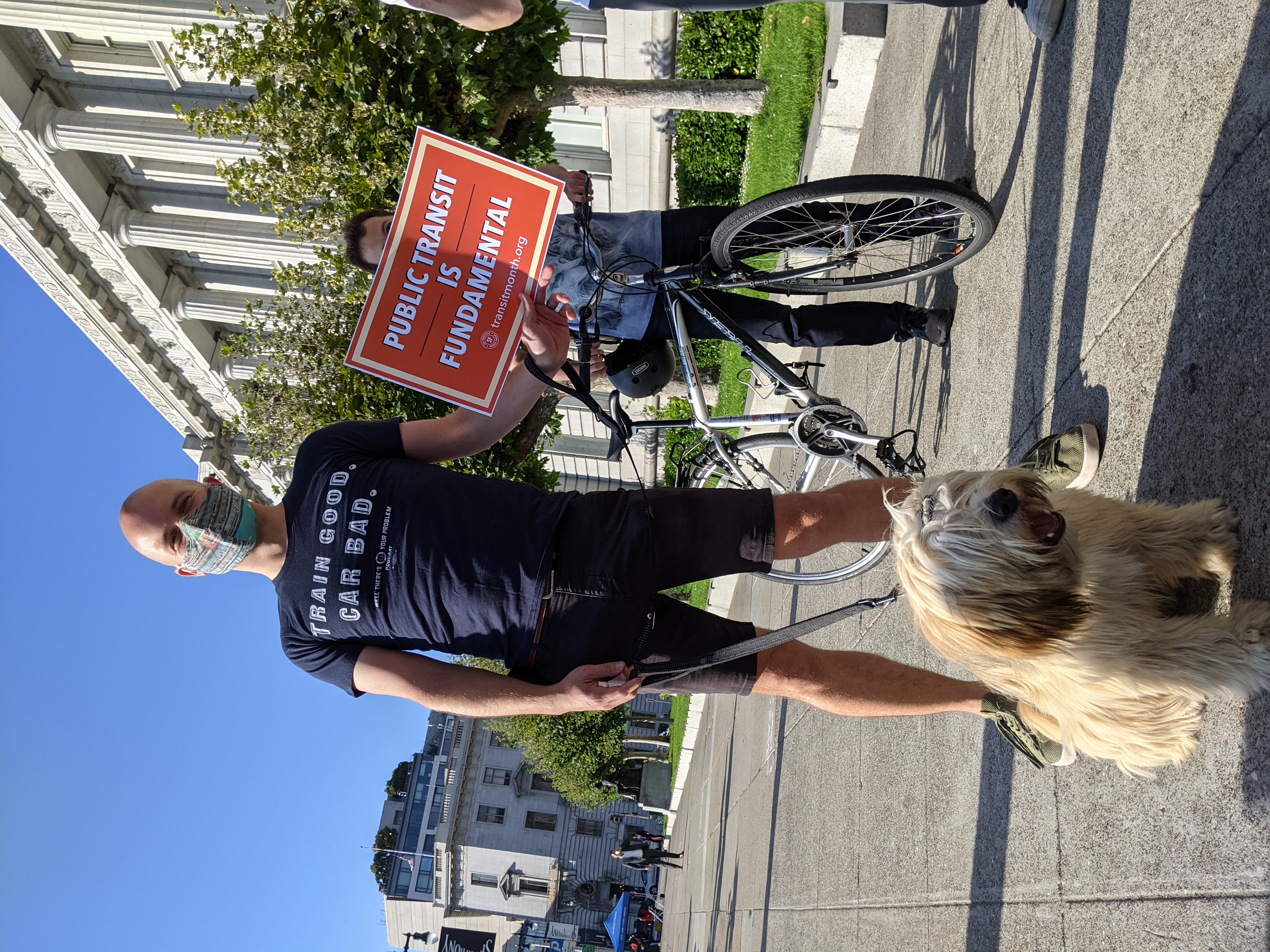 Austin Elliott, sporting an on-message t-shirt, and his dog Ajira