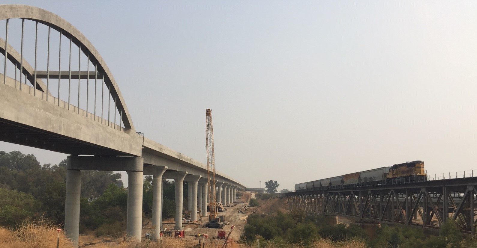 HSR in the Central Valley doesn't share tracks with existing trains, but runs close in most places. Photo: Joe Linton