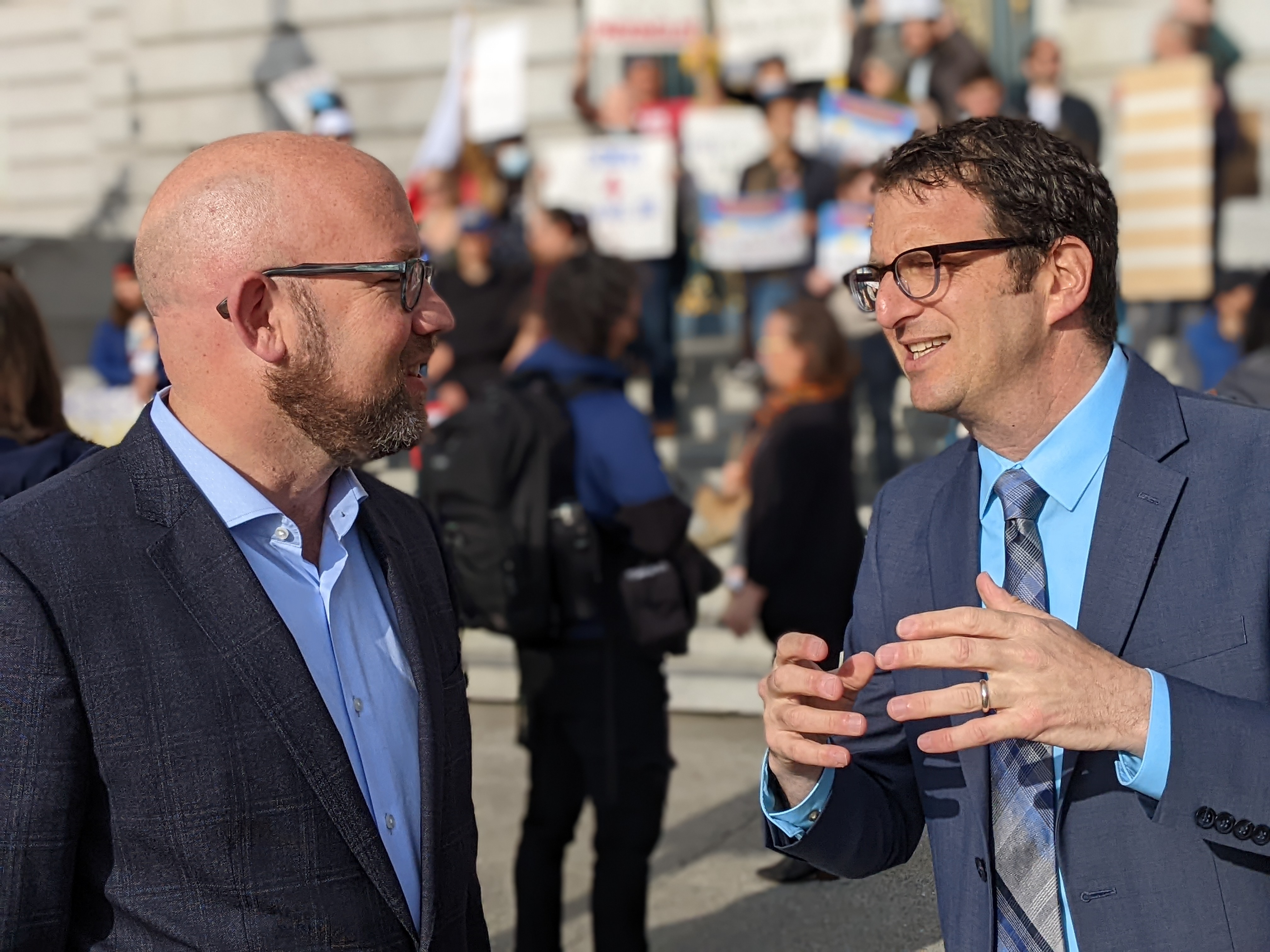 Supervisors Rafael Mandelman and Dean Preston at the pre-hearing rally. Photo: Streetsblog/Rudick