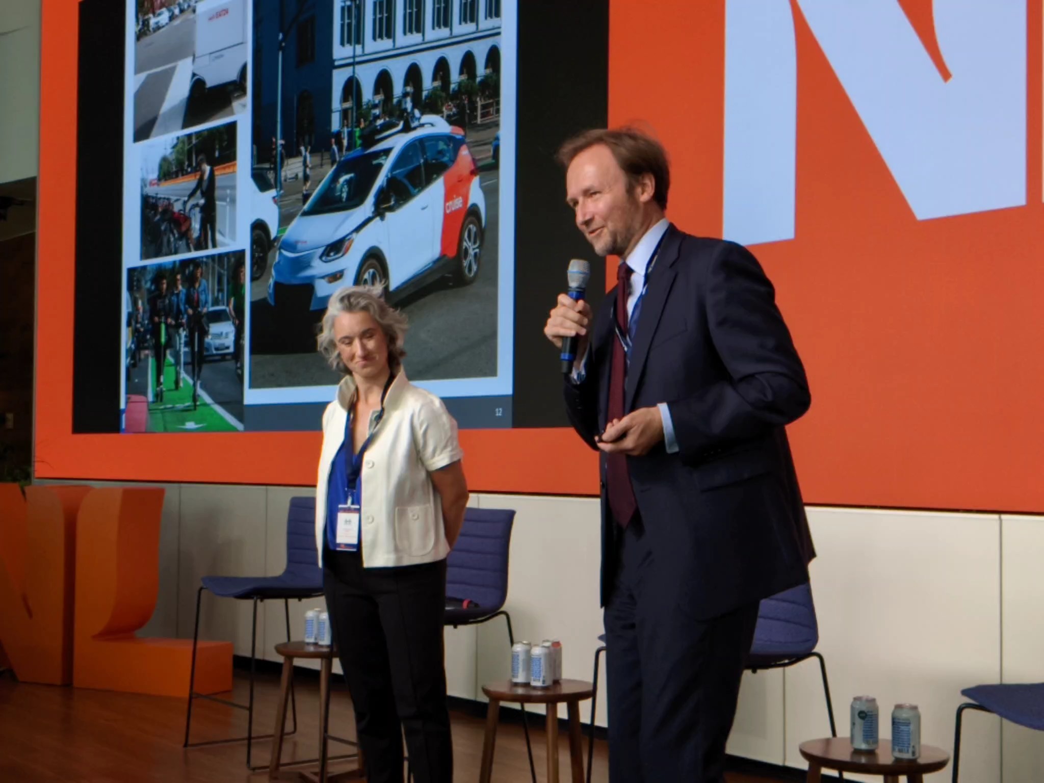 Alex Sweet and Tom MacGuire presenting at Tuesday's Dutch conference. Photo: Streetsblog/Rudick