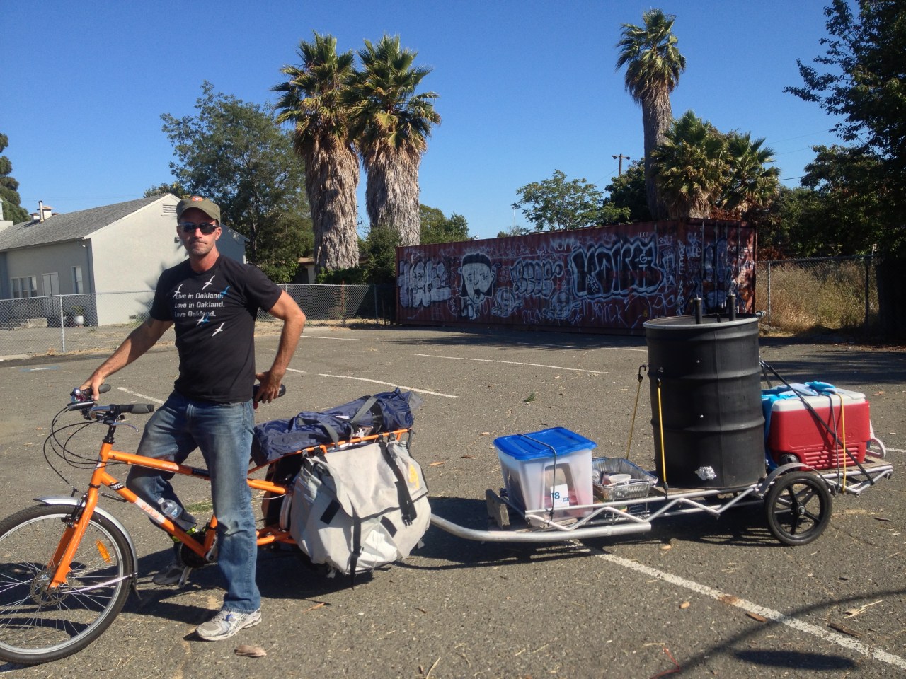 Dave with his bicycle BBQ rig in tow during an event in Oakland.