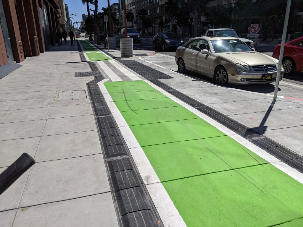 Eyes on the Street: San Francisco Joins the Sidewalk-Level Bike Lane Club